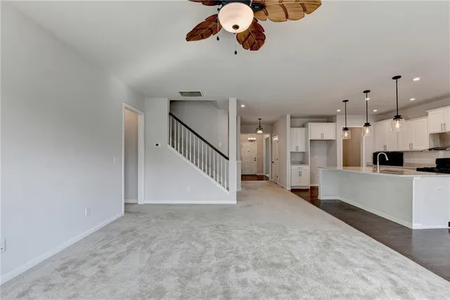 a room with a window and a mirror