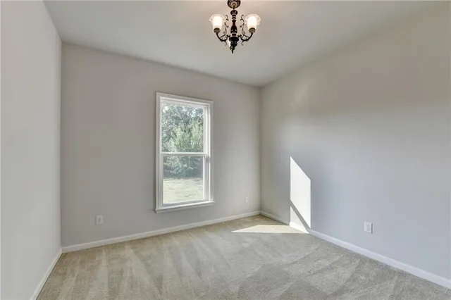 a view of a room that has a window