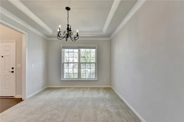 wooden floor with white walls