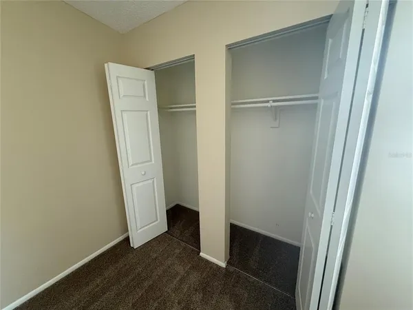 a kitchen with a stove and a refrigerator