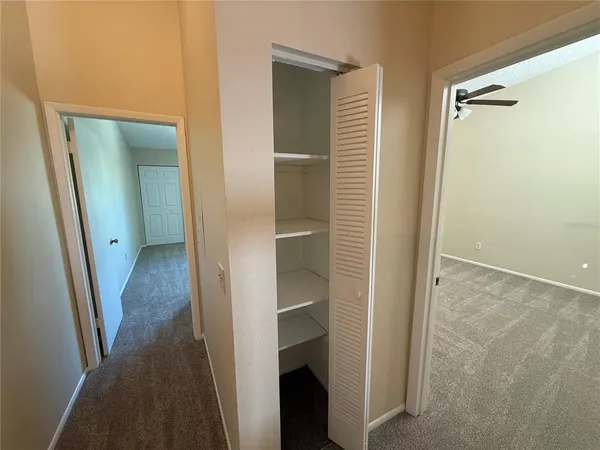 a kitchen with a sink and a stove top oven