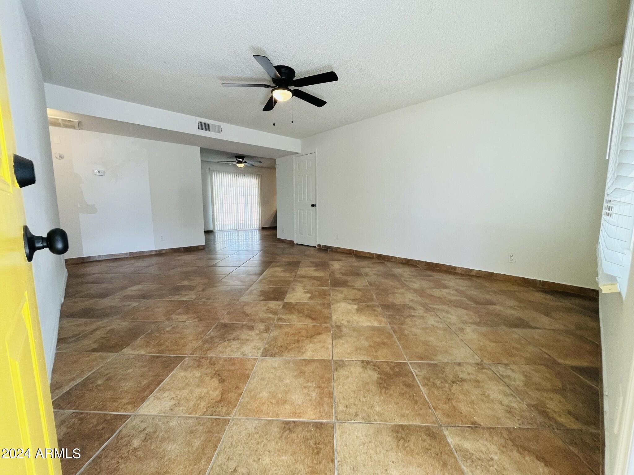 5154 West Berkeley Road Phoenix, AZ 85035 - Photo 2 of 19 a view of an empty room