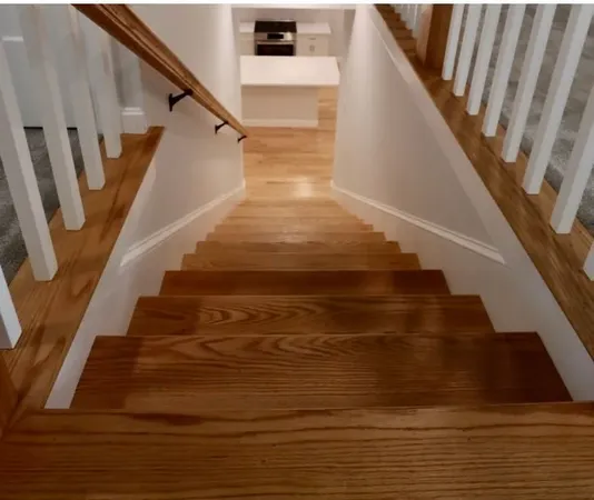 a view of a hallway with staircase