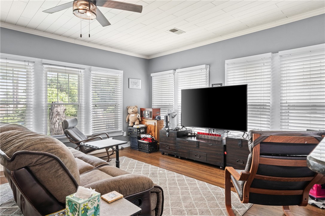 2016 Gorman Avenue Waco, TX 76707 - Photo 24 of 37 a living room with furniture and a flat screen tv