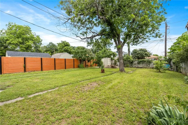 a view of a backyard with a slide