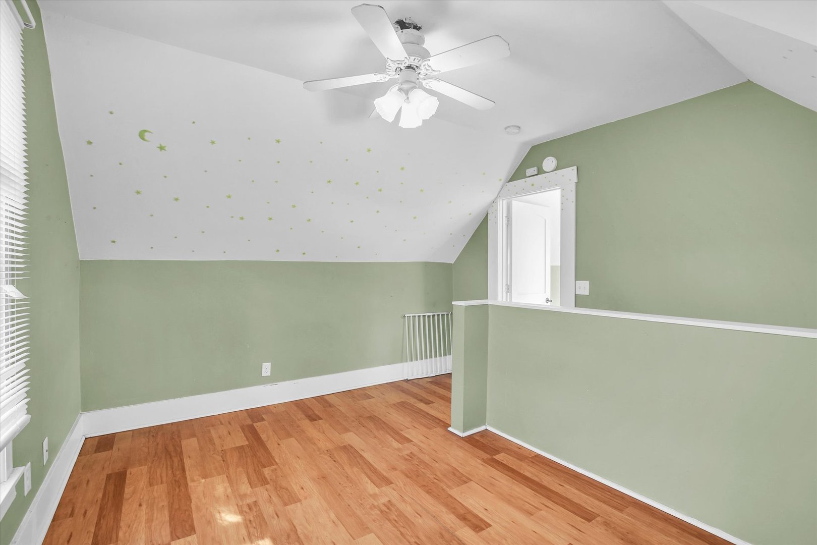 107 Byron Street Sidney, IL 61877 - Photo 22 of 31 an empty room with a window and a ceiling fan