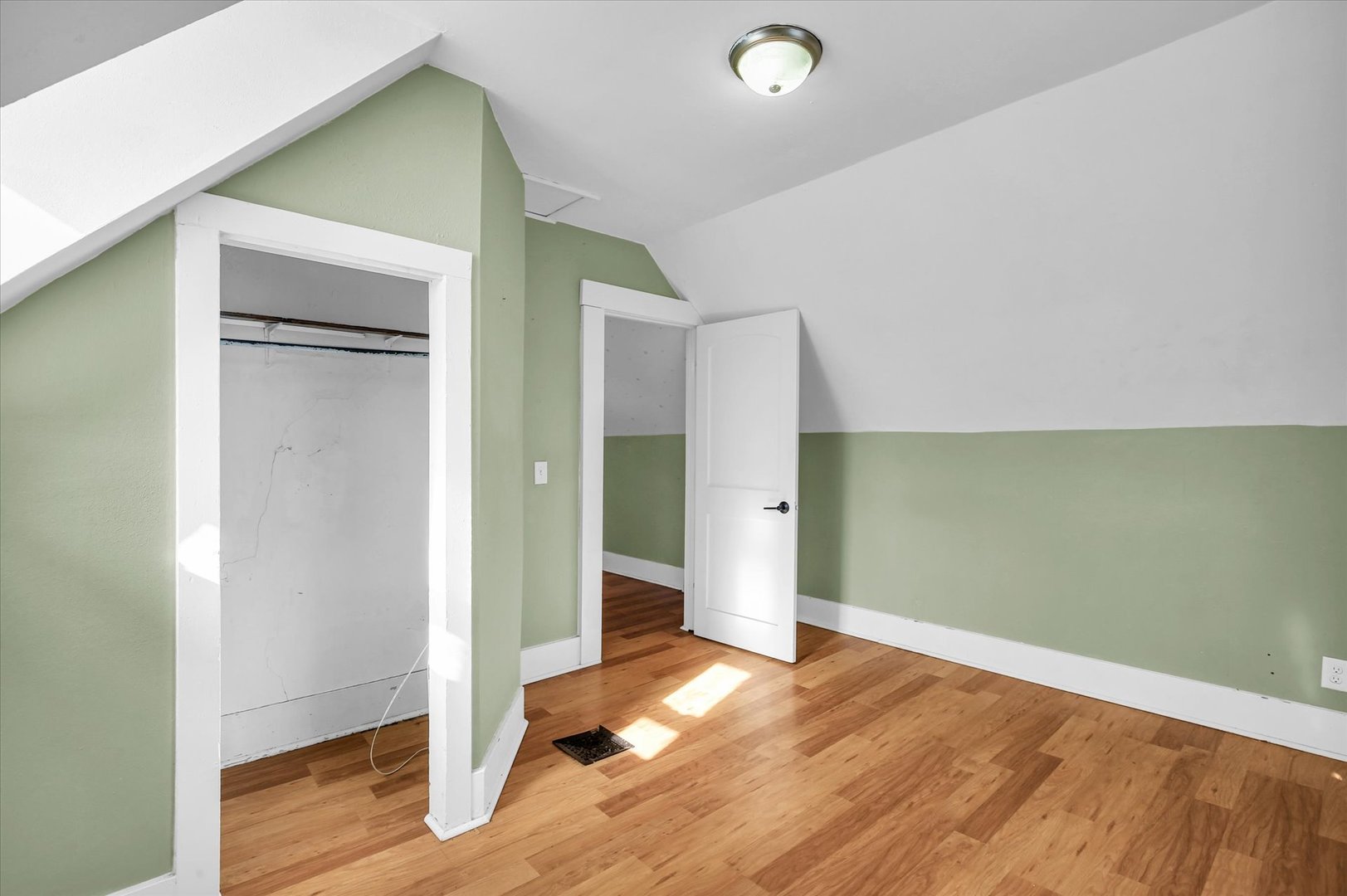 107 Byron Street Sidney, IL 61877 - Photo 24 of 31 a view of entryway with wooden floor