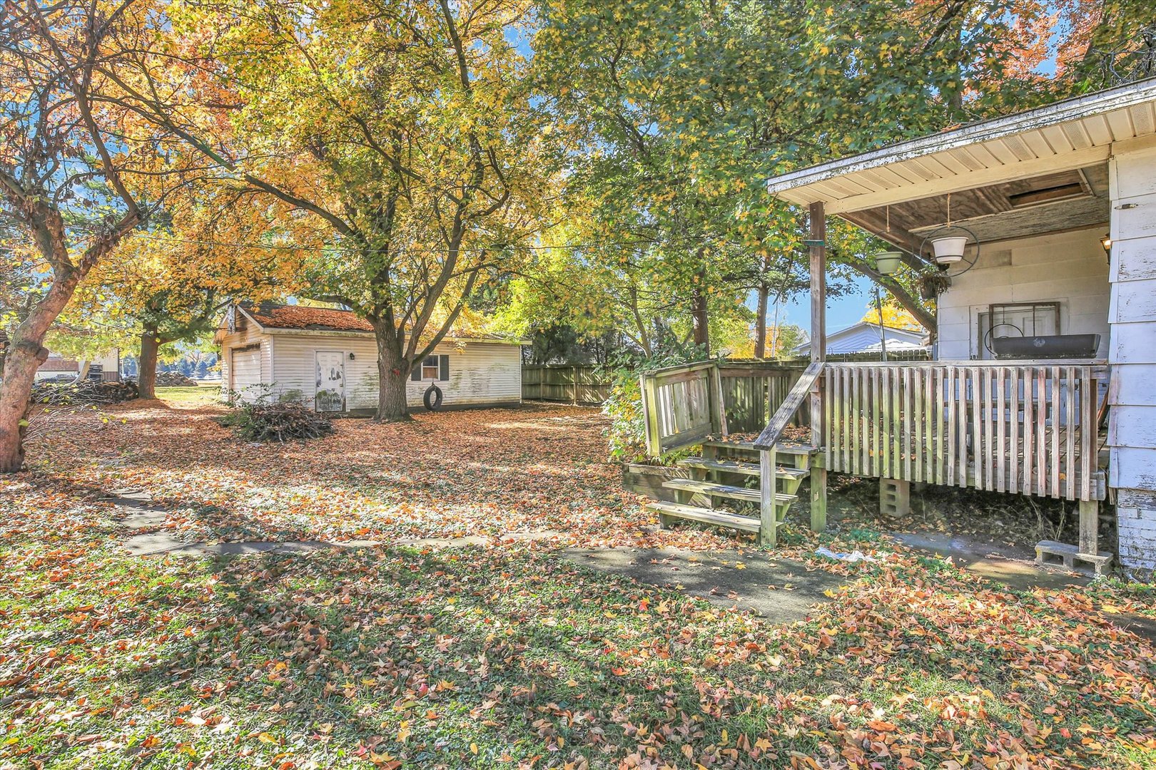 107 Byron Street Sidney, IL 61877 - Photo 27 of 31 a view of a house with a yard