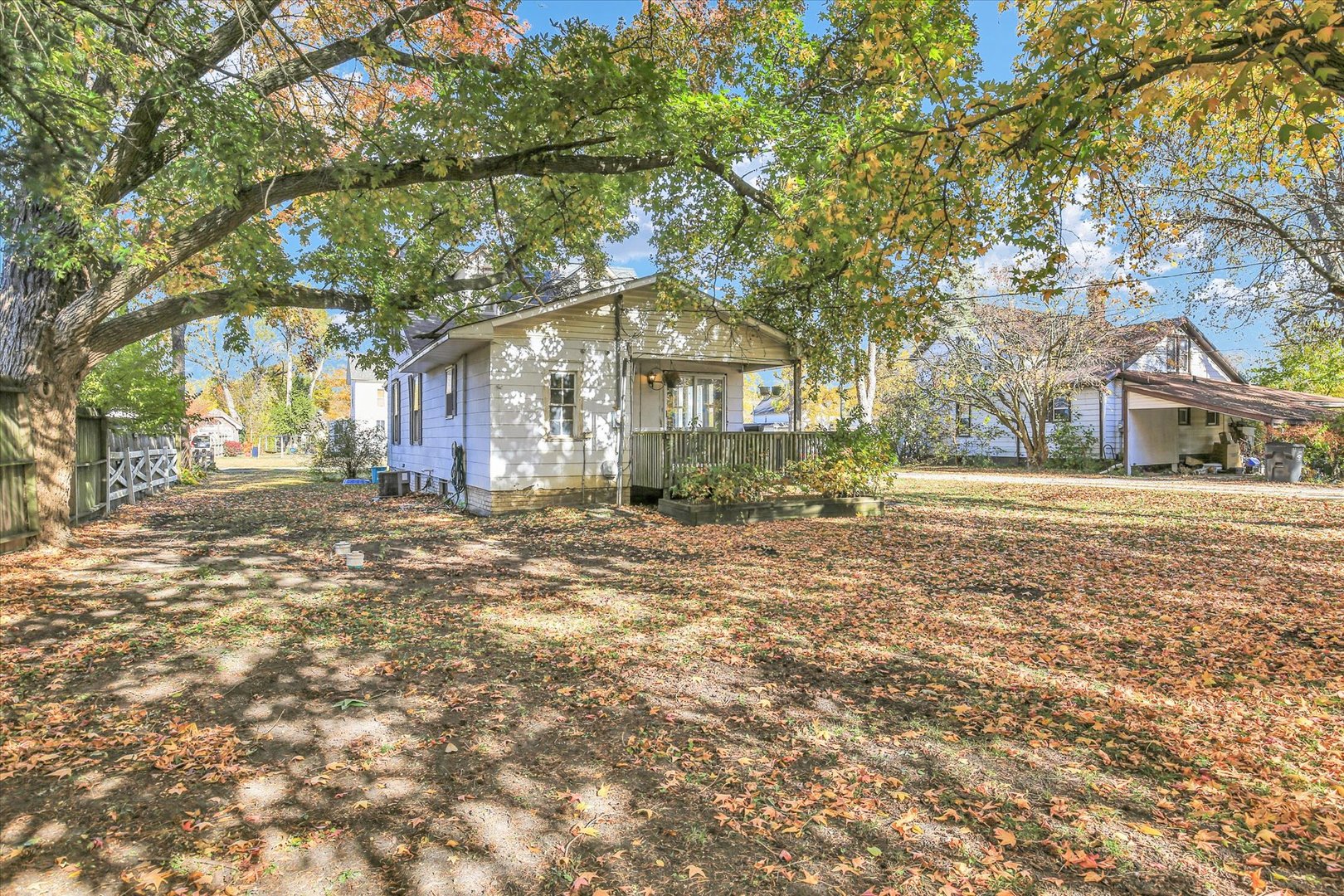 107 Byron Street Sidney, IL 61877 - Photo 29 of 31 a front view of a house with a yard