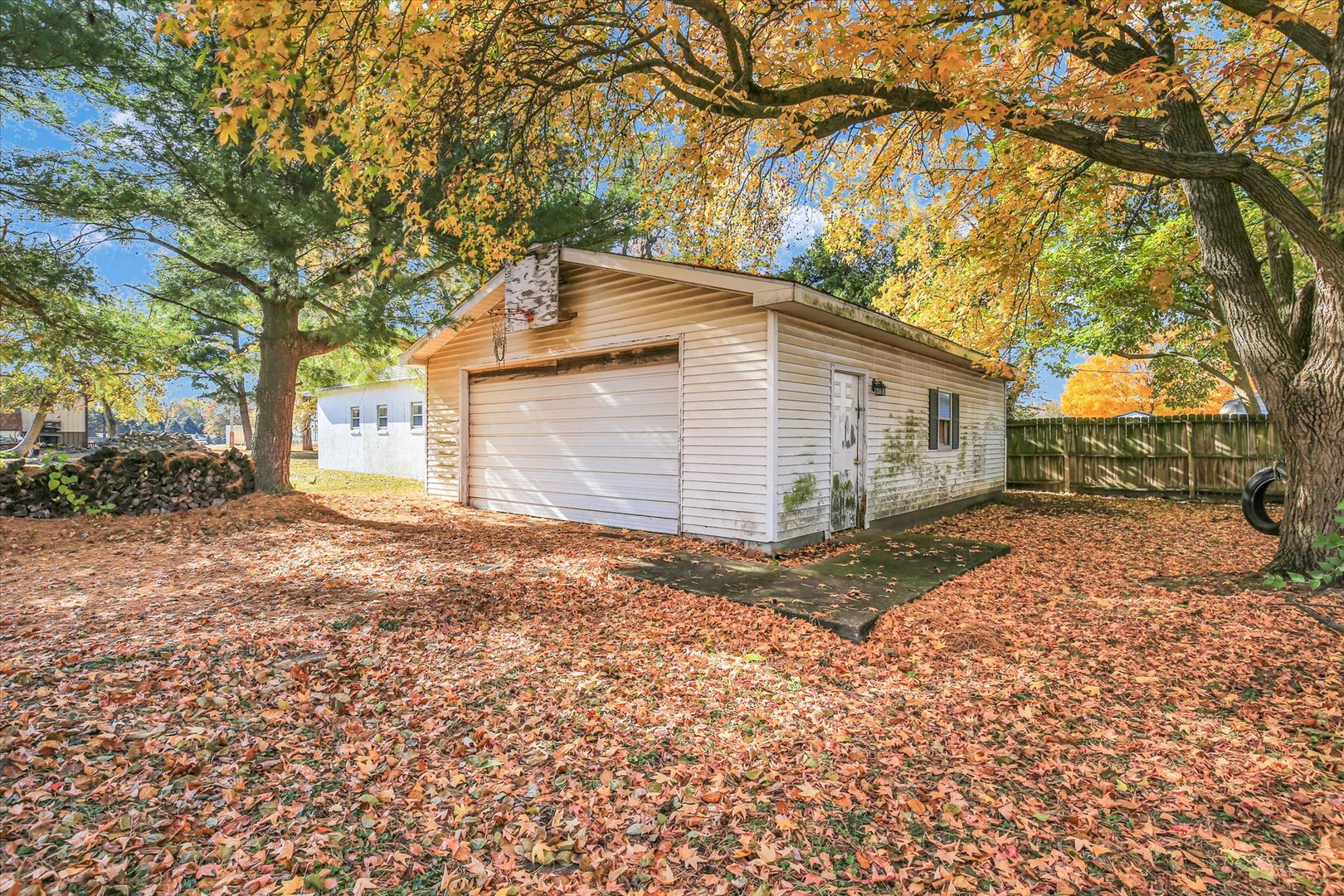 107 Byron Street Sidney, IL 61877 - Photo 30 of 31 a view of a house with a yard