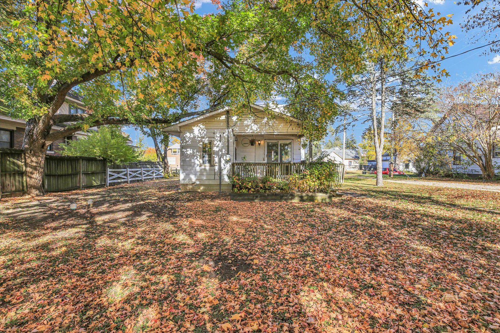 107 Byron Street Sidney, IL 61877 - Photo 31 of 31 a front view of a house with a yard and garage