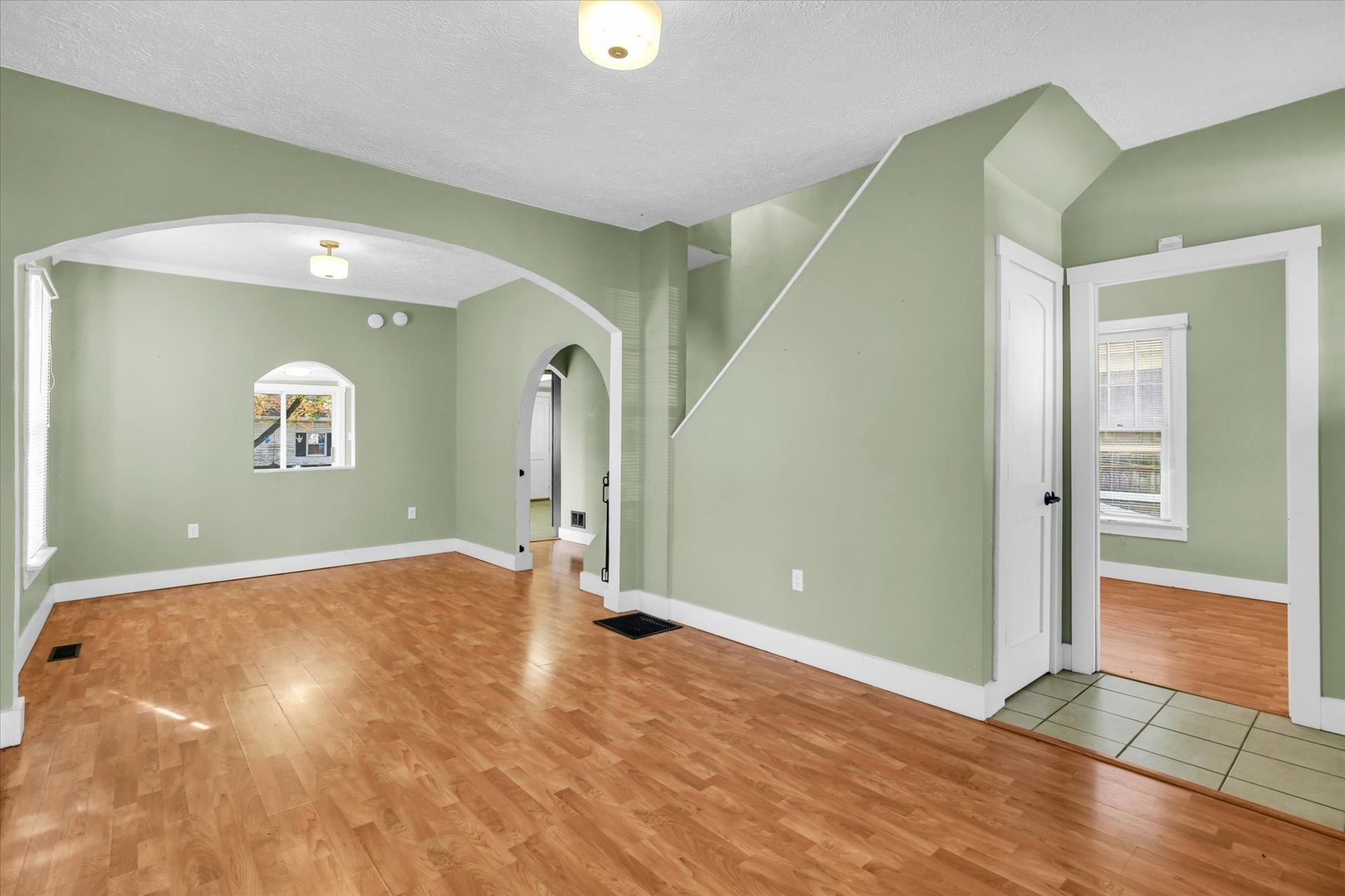 107 Byron Street Sidney, IL 61877 - Photo 7 of 31 a view of a livingroom with a staircase