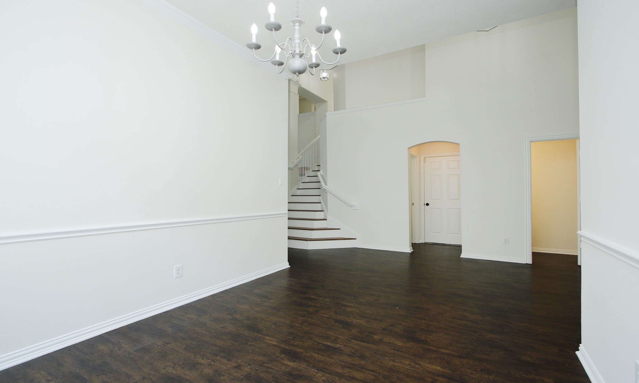 1210 Berwick Manor Court Spring, TX 77379 - Photo 16 of 50 a view of an empty room with wooden floor
