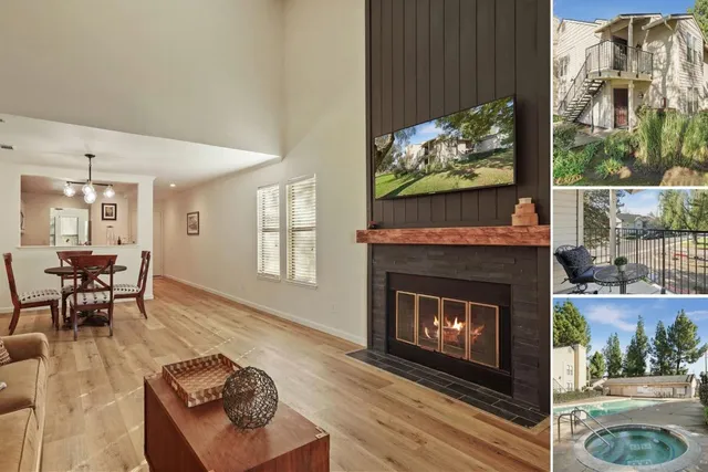 a view of a house with a yard and a pond