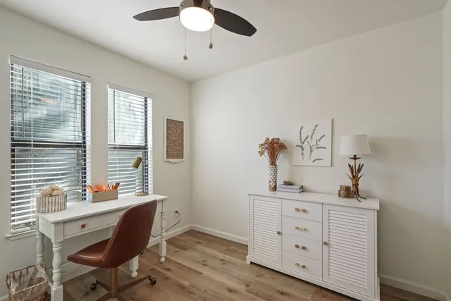 a kitchen with stainless steel appliances granite countertop a sink stove and microwave