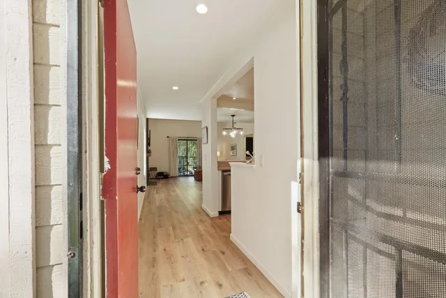 a view of balcony with furniture
