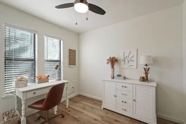 a view of a workspace with furniture