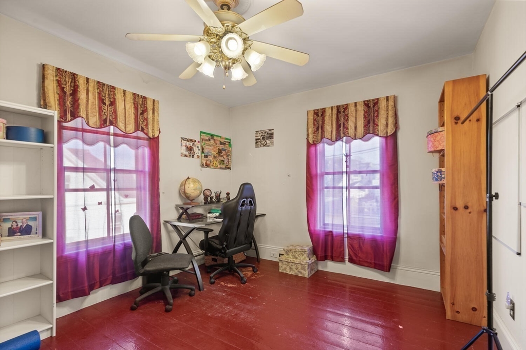 118 Prospect Street Gloucester, MA 01930 - Photo 22 of 36 a view of a livingroom with workspace and a window