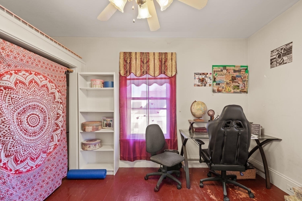 118 Prospect Street Gloucester, MA 01930 - Photo 23 of 36 a view of a workspace with furniture and a window