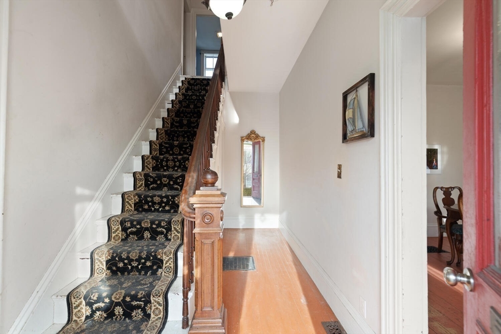 118 Prospect Street Gloucester, MA 01930 - Photo 5 of 36 a view of entryway with wooden floor