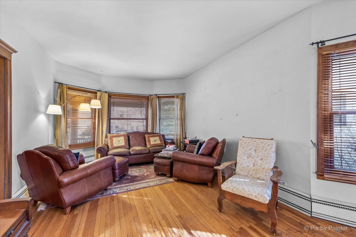 84 Kimbark Road Riverside, IL 60546 - Photo 4 of 40 a living room with furniture and a large window