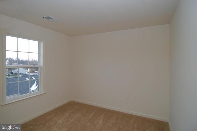 74 Shelby Road Inwood, WV 25428 - Photo 17 of 27 a view of empty room with window