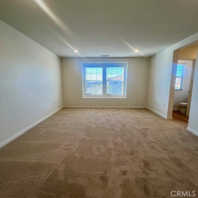 4235 East Rincon Street Ontario, CA 91761 - Photo 16 of 40 en empty room with windows