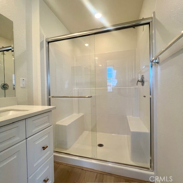 4235 East Rincon Street Ontario, CA 91761 - Photo 19 of 40 a bathroom with a shower and a sink