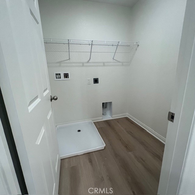 4235 East Rincon Street Ontario, CA 91761 - Photo 21 of 40 a view of a room with wooden floor and white walls