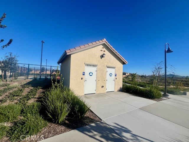 4235 East Rincon Street Ontario, CA 91761 - Photo 39 of 40 a view of a house with backyard and deck