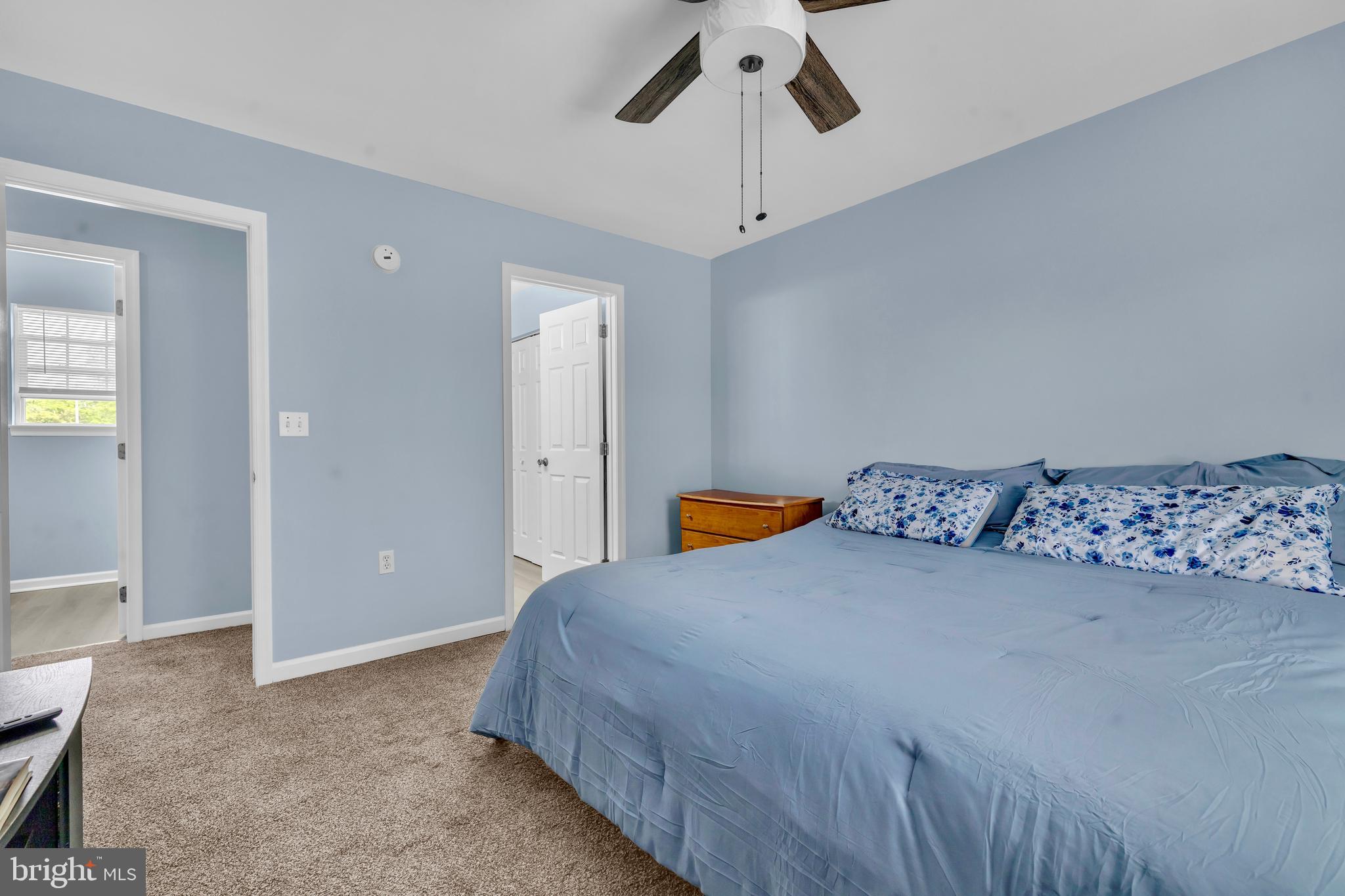 202 Maryland Avenue Ridgely, MD 21660 - Photo 12 of 18 a bedroom with bed and window