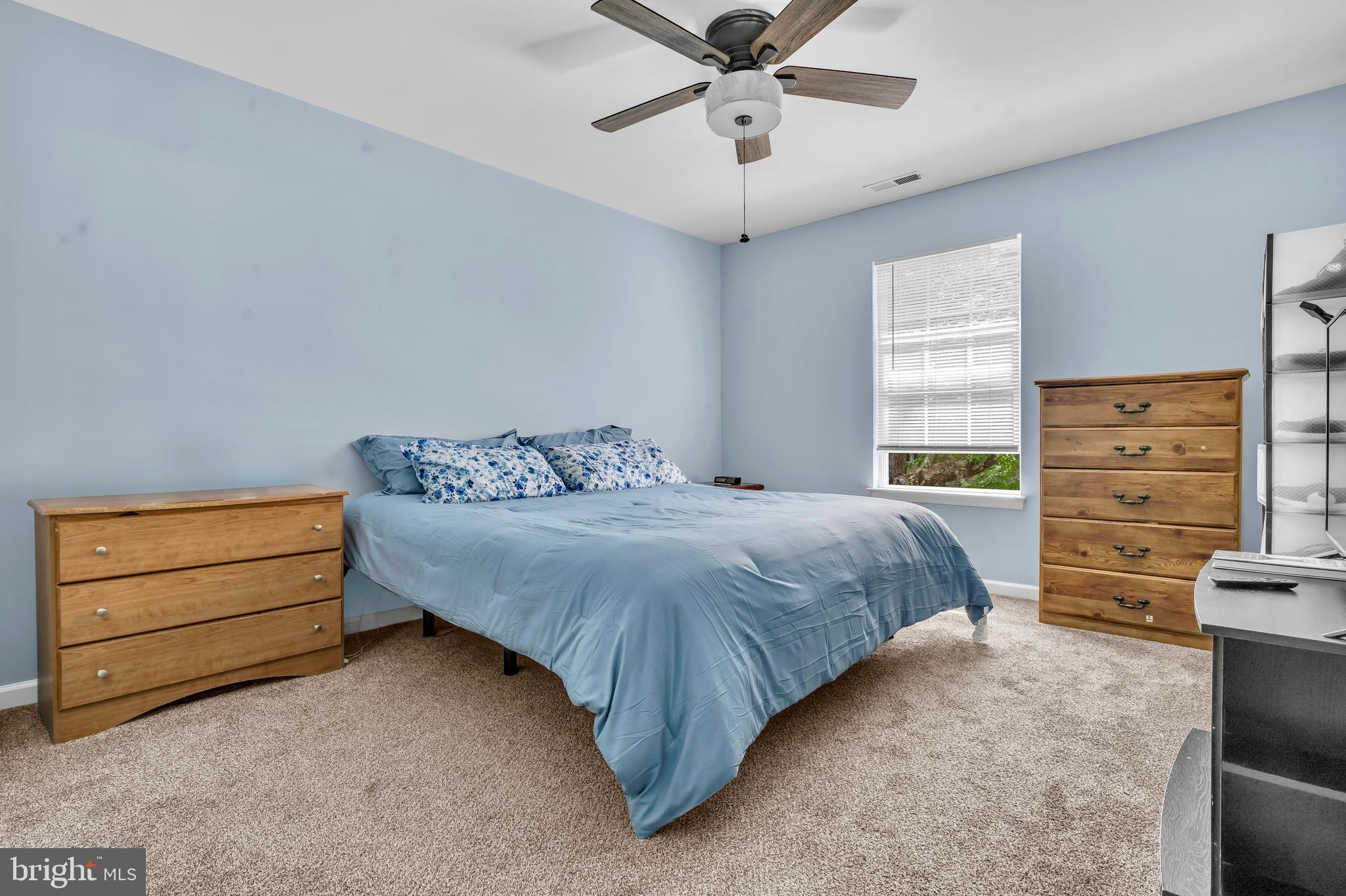 202 Maryland Avenue Ridgely, MD 21660 - Photo 13 of 18 a bedroom with a bed and a closet