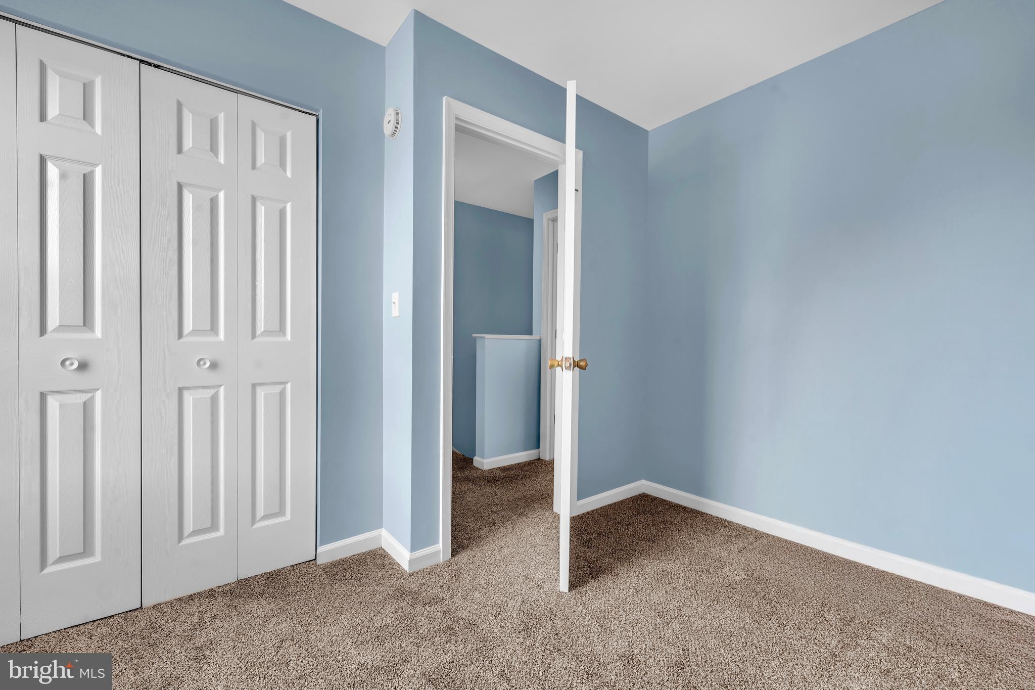 202 Maryland Avenue Ridgely, MD 21660 - Photo 14 of 18 an empty room with windows