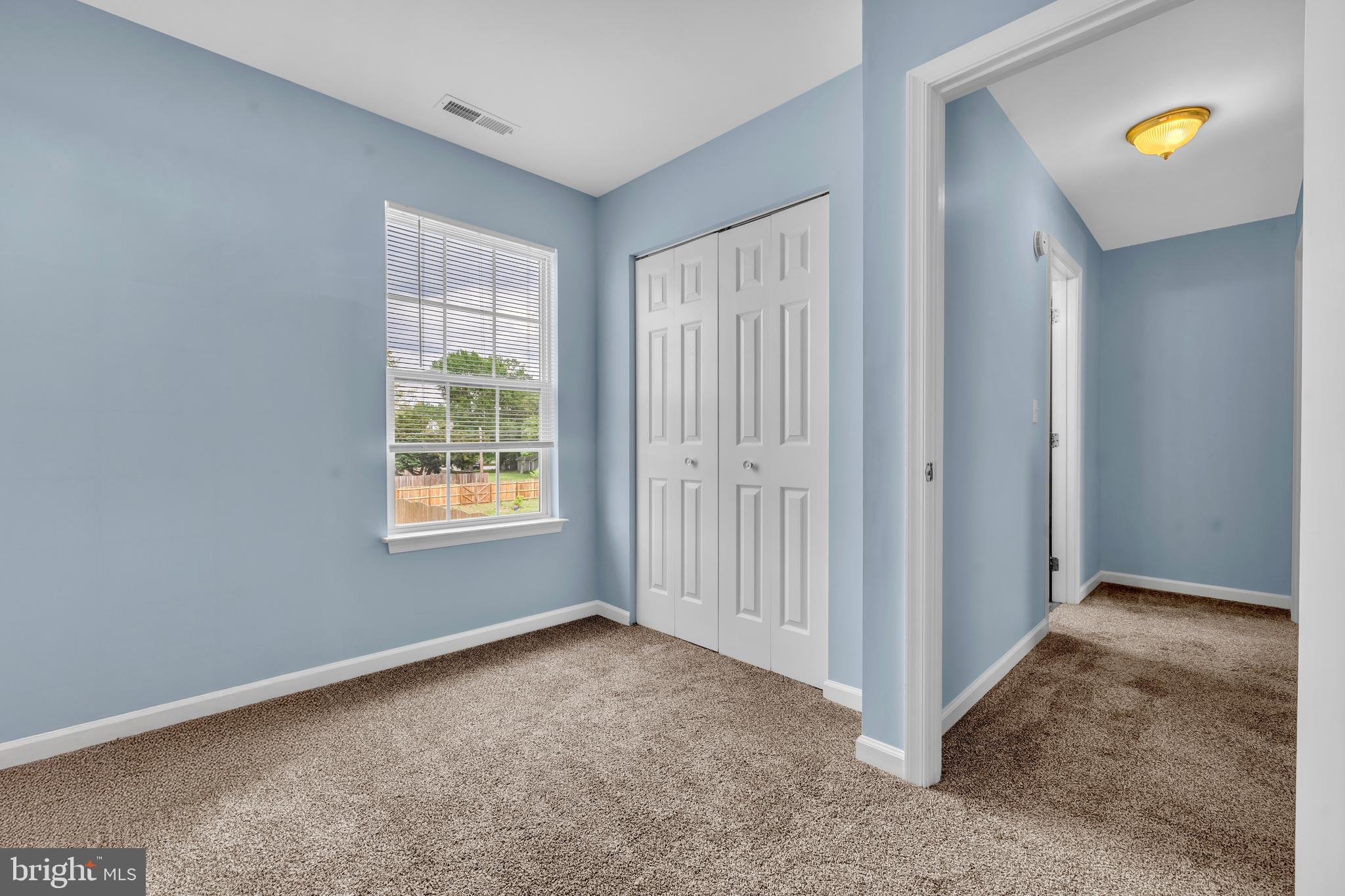 202 Maryland Avenue Ridgely, MD 21660 - Photo 15 of 18 a view of an empty room with a window