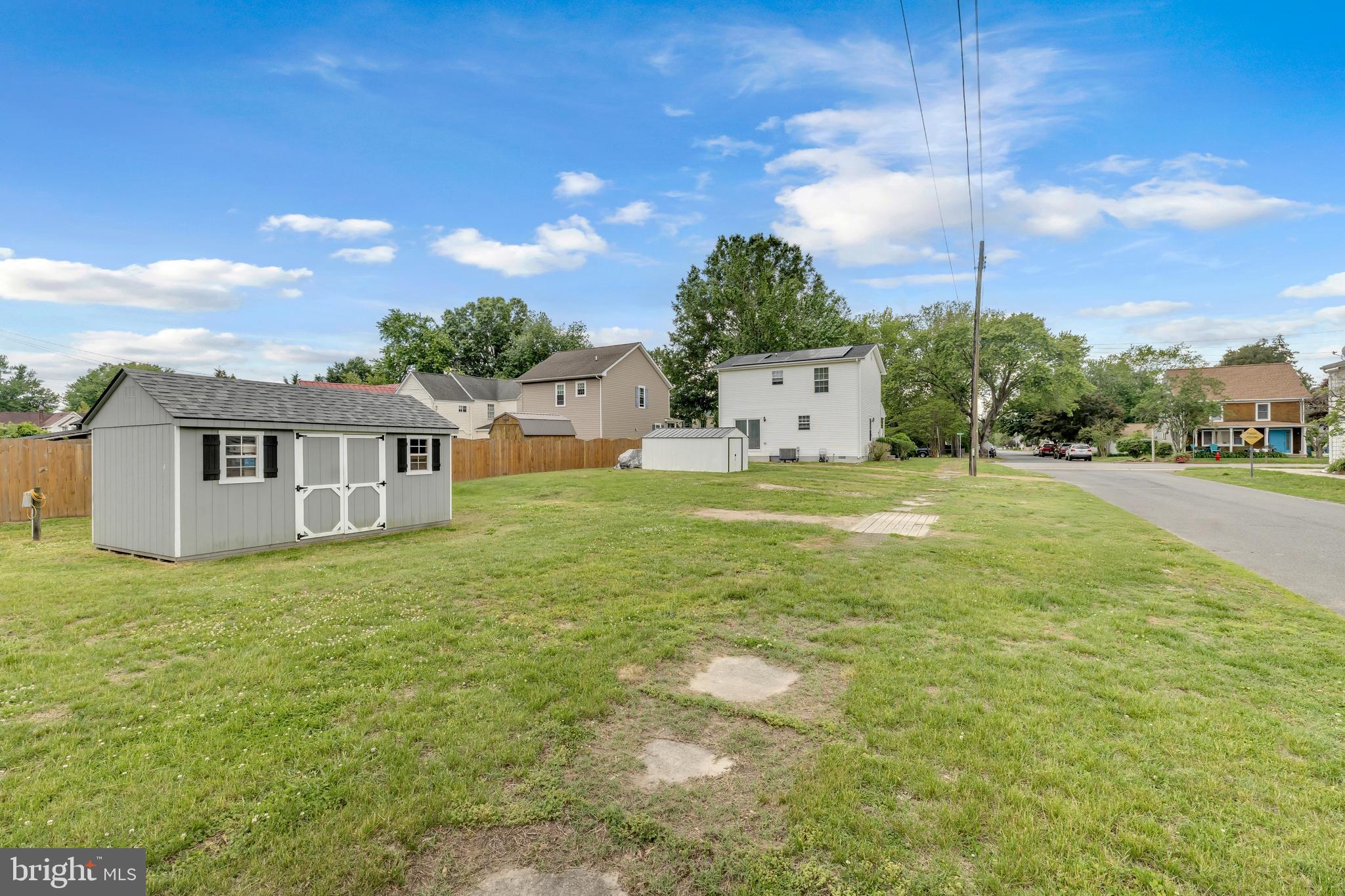 202 Maryland Avenue Ridgely, MD 21660 - Photo 17 of 18 a view of a house with a yard and garage