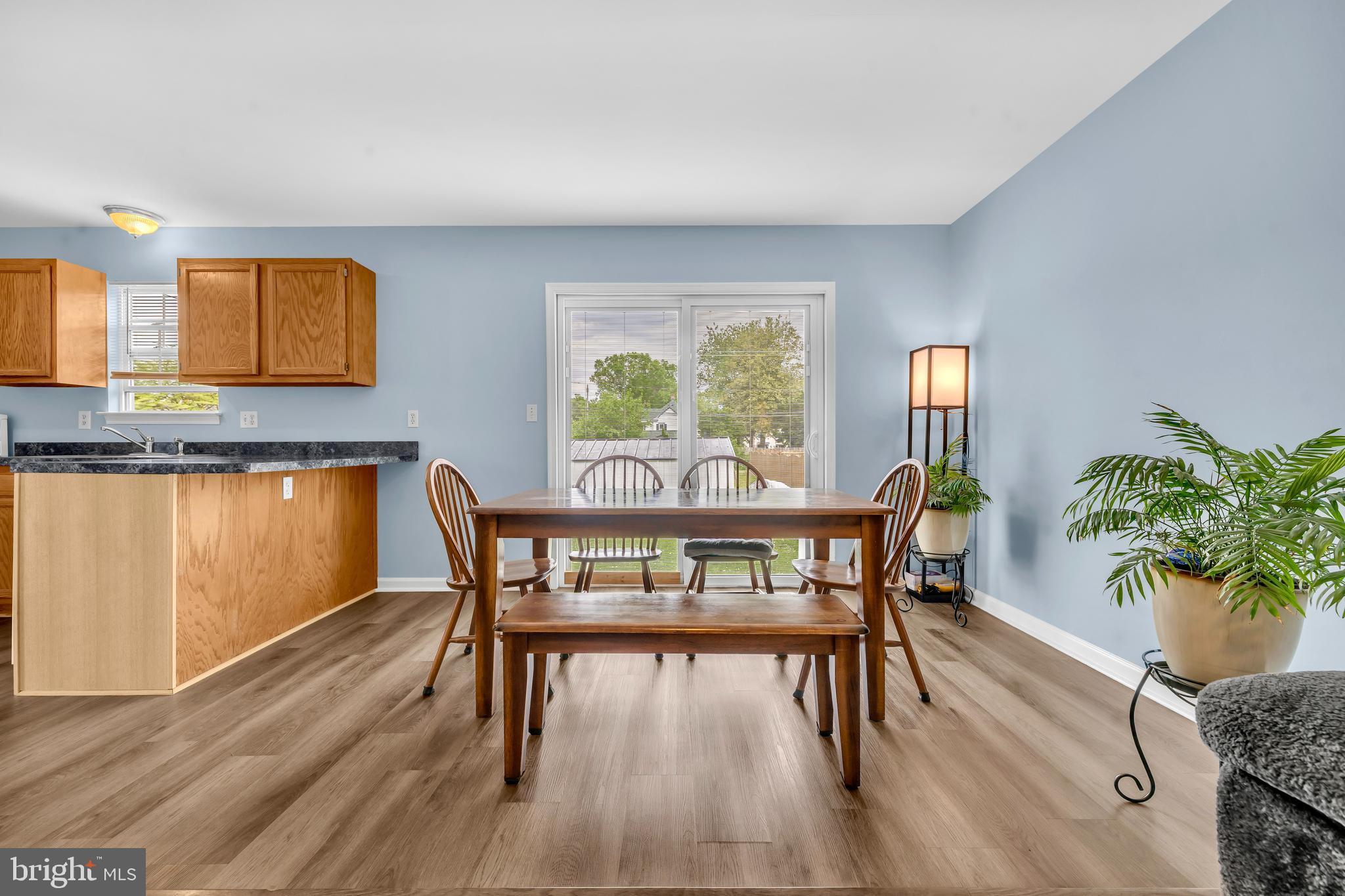 202 Maryland Avenue Ridgely, MD 21660 - Photo 3 of 18 a view of a dining room with furniture window and wooden floor