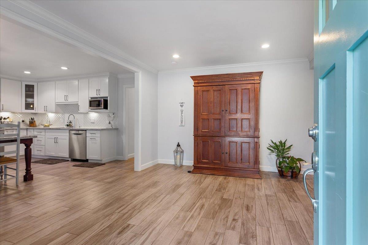 751 Eschenburg Drive Gilroy, CA 95020 - Photo 16 of 39 a view of kitchen with wooden floor and electronic appliances