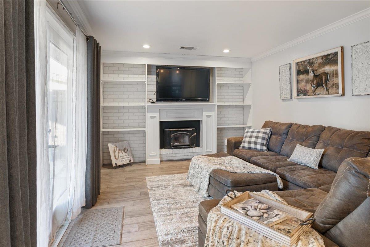 751 Eschenburg Drive Gilroy, CA 95020 - Photo 25 of 39 a living room with furniture and a flat screen tv