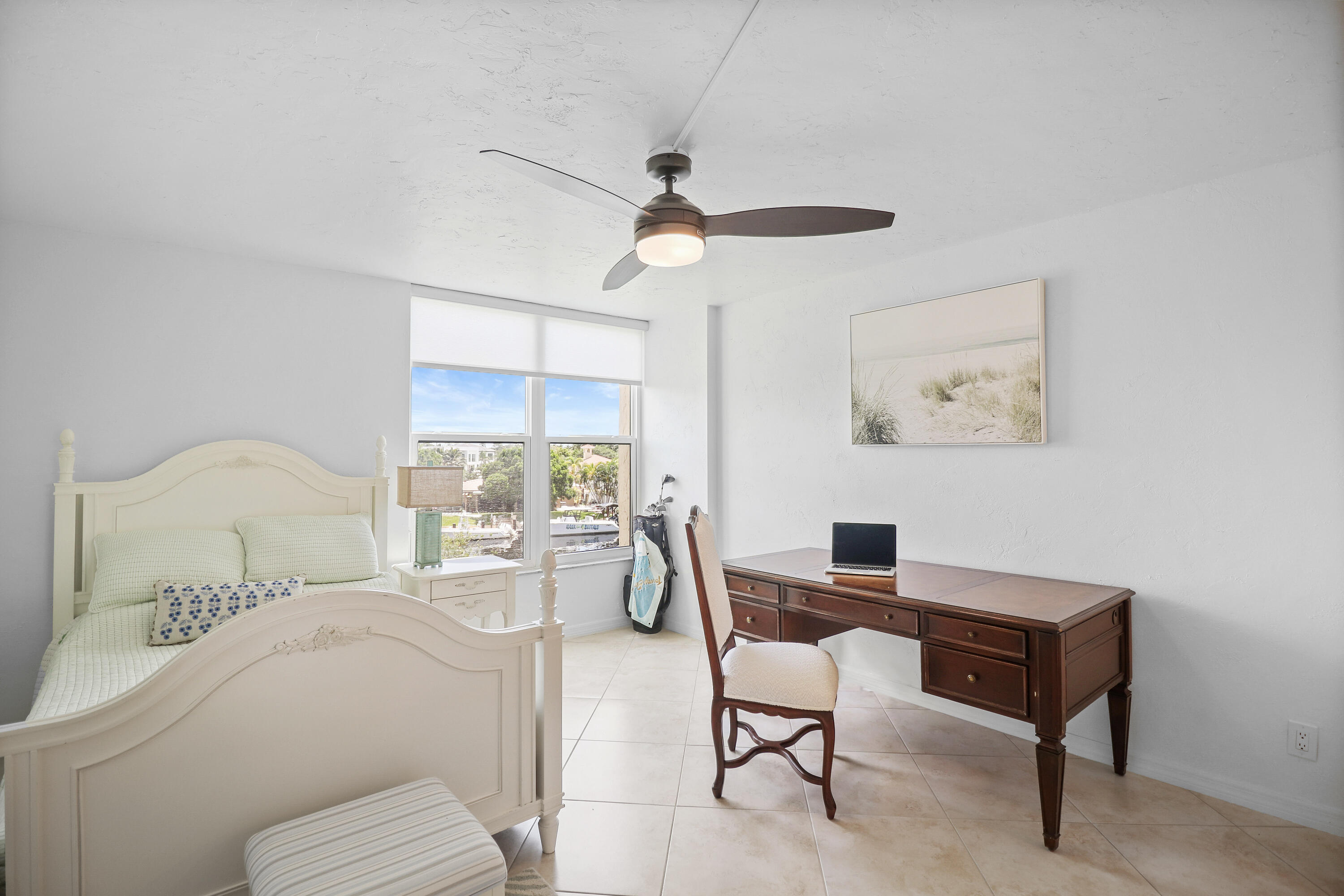 13 Royal Palm Way, Unit 302 Boca Raton, FL 33432 - Photo 11 of 31 a living room with furniture a couch and a chandelier