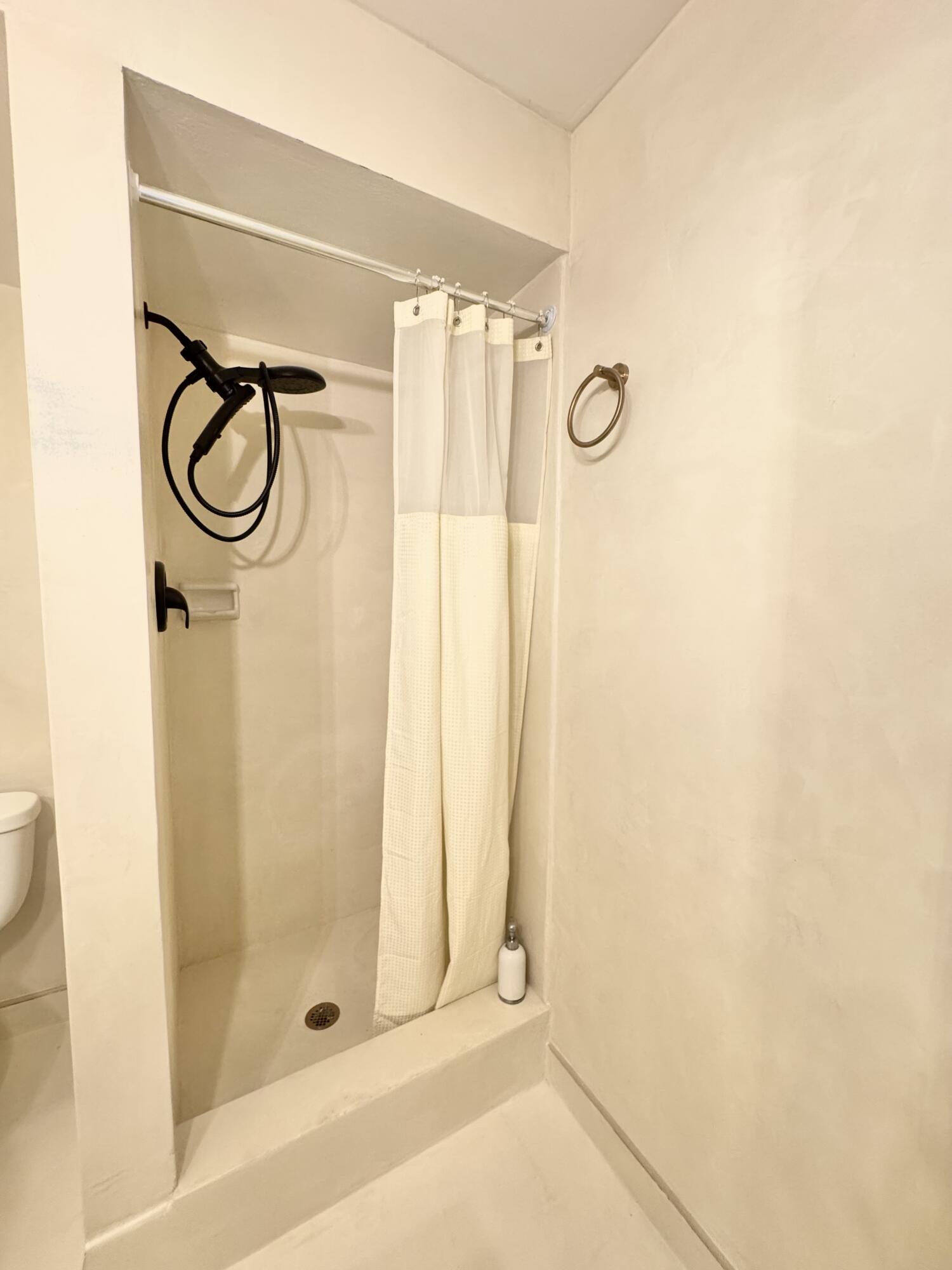 13 Royal Palm Way, Unit 302 Boca Raton, FL 33432 - Photo 20 of 31 a bathroom with a shower