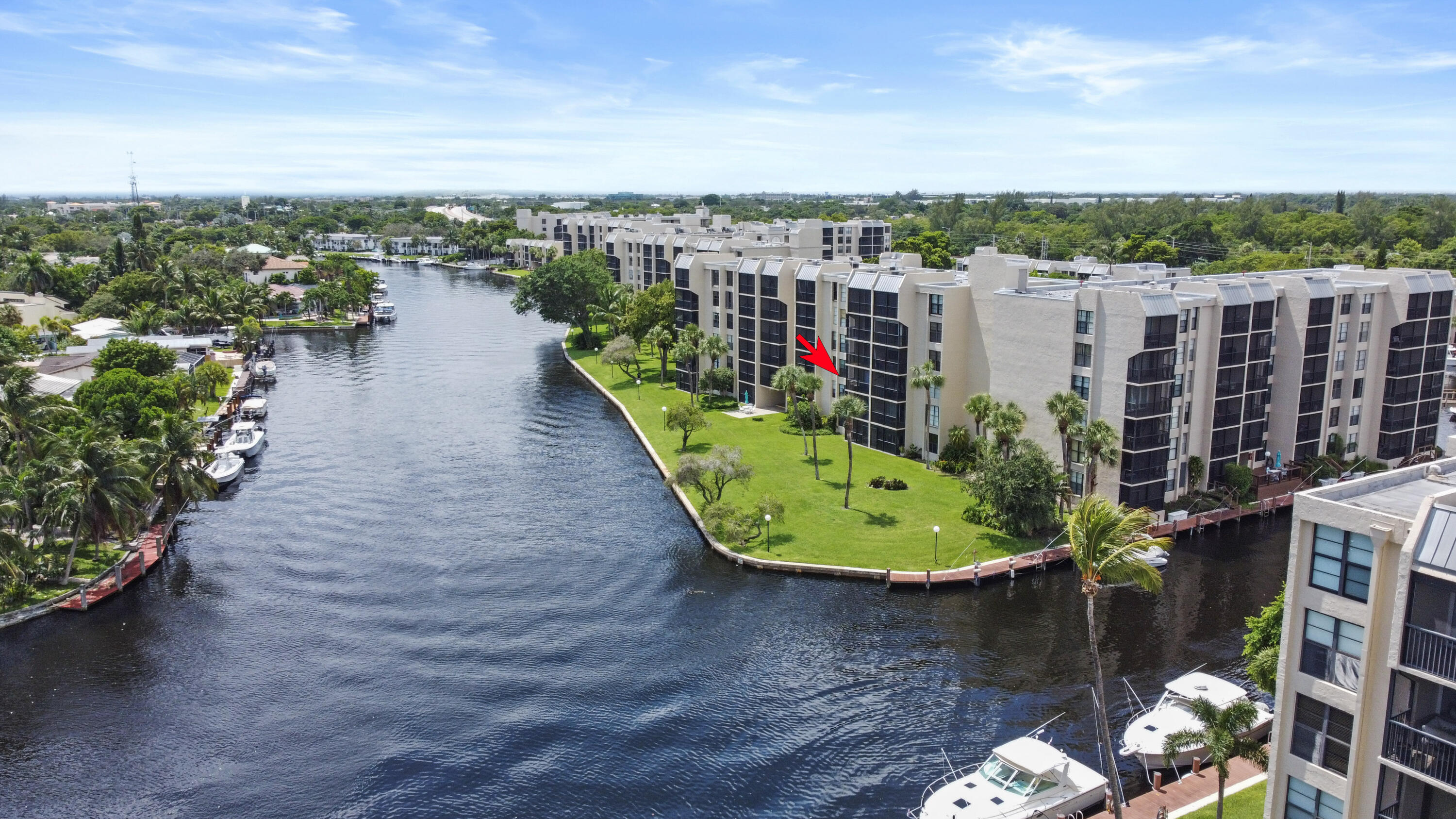 13 Royal Palm Way, Unit 302 Boca Raton, FL 33432 - Photo 21 of 31 a view of a lake with a terrace