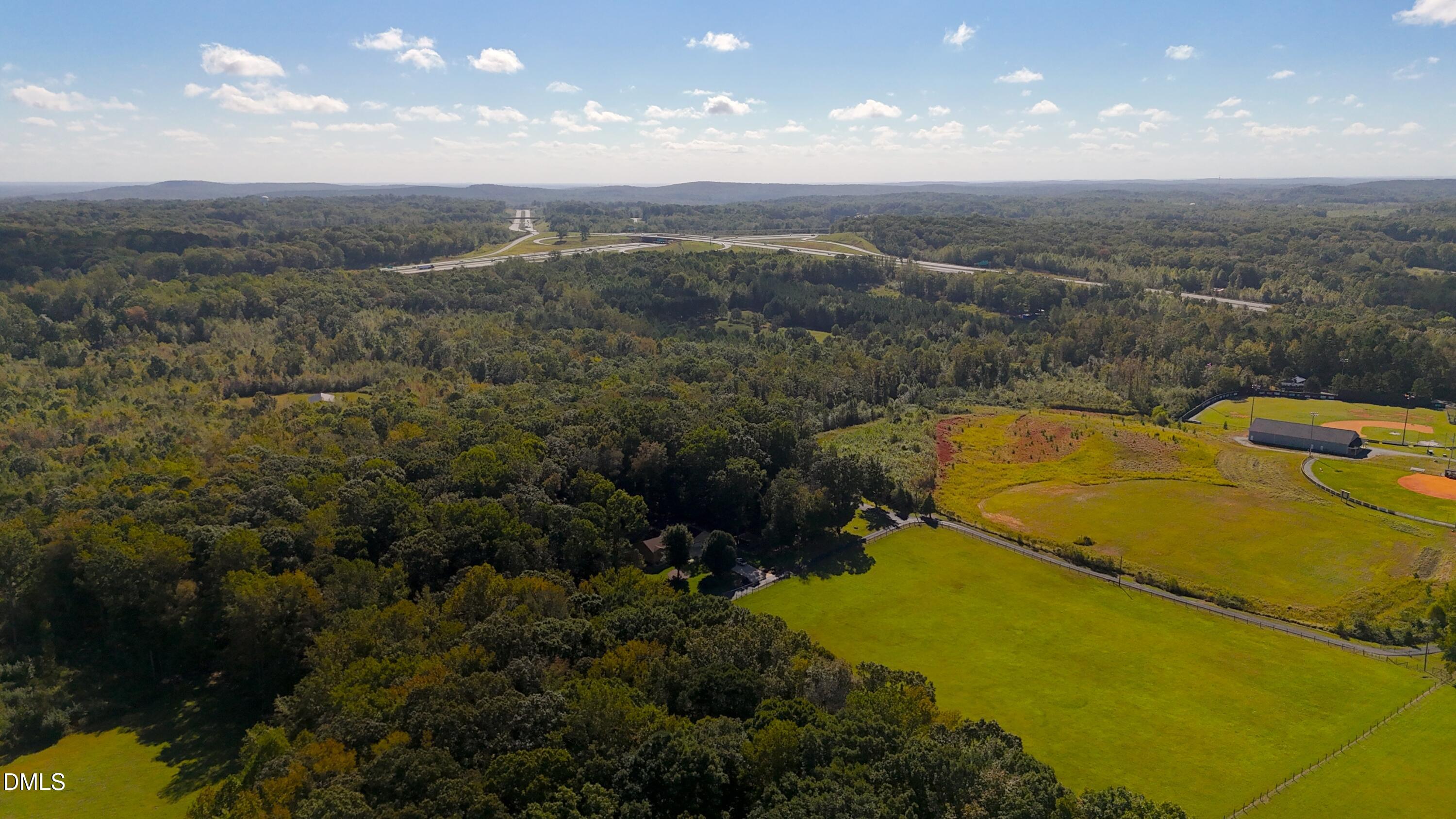 1 Mack Road Asheboro, NC 27205 - Photo 15 of 24 a view of a swimming pool and mountains in the background