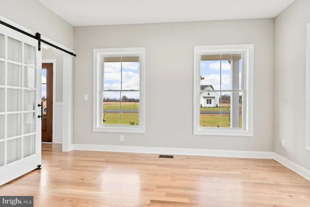 a view of a room that has a window in it