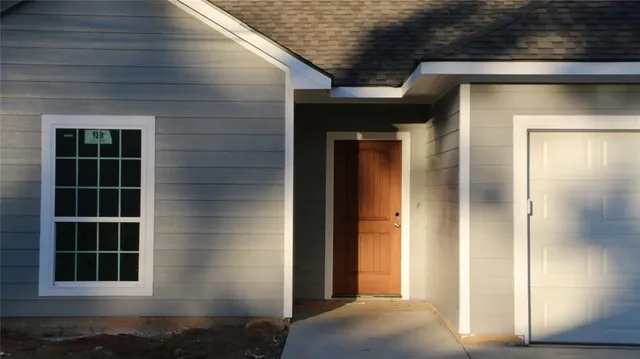 a front view of a house with a window