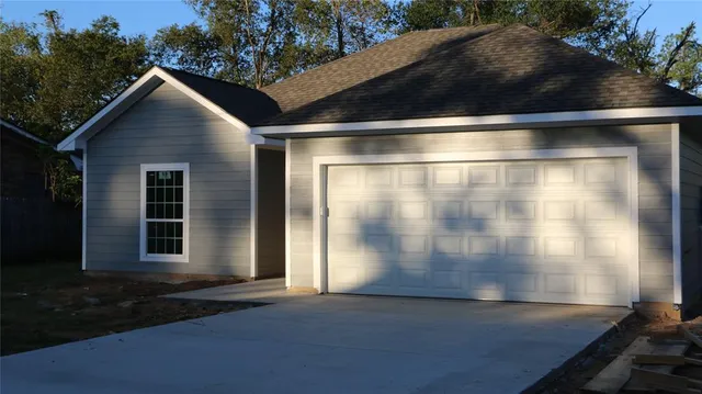 a view of backyard of a house