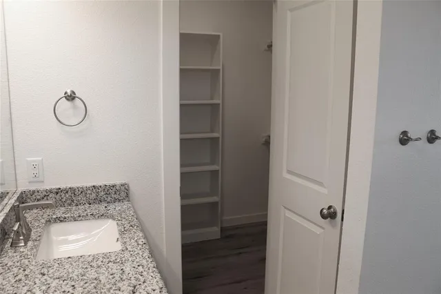 a bathroom with a toilet and a sink