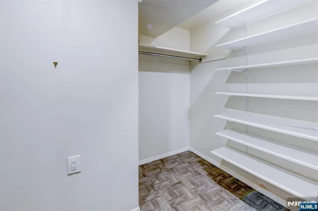 a view of an empty walk in closet