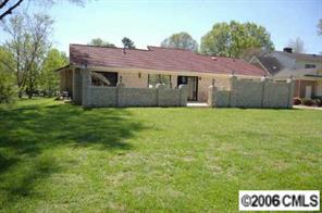 135 Hodgson Road Charlotte, NC 28211 - Photo 2 of 7 a view of a house with a yard