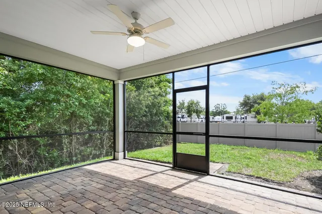 a view of a room with a large window