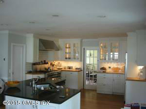25 Terrace Avenue Riverside, CT 06878 - Photo 4 of 10 a kitchen with granite countertop a sink and a stove